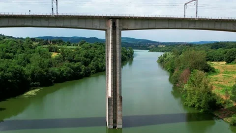 Aerial going up drone view Rail Bridge Tuscany Italy above Arno Dante's River Stock Footage 196783429