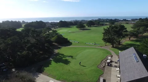 Aerial of golf course with ocean Stock Footage 62052205
