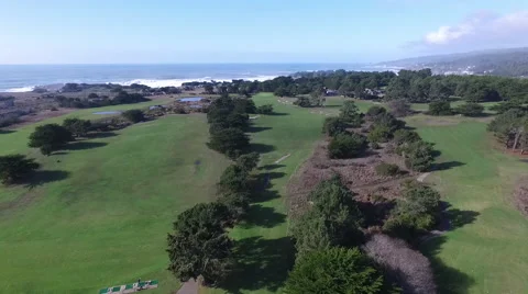 Aerial of golf course with ocean Stock Footage 62205686