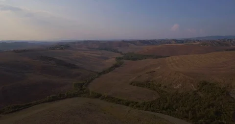 Aerial, gorgeous plowed fields landscape in Tuscany Stock Footage 102437168