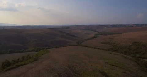 Aerial, gorgeous plowed fields landscape in Tuscany Stock Footage 107470290