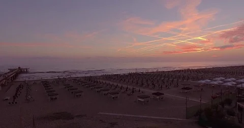 Aerial, gorgeous sunset on empty beach by the pier in Forte dei Marmi, Italy Stockbeeldmateriaal 78941474