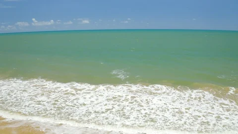 Aerial, gorgeous view on the ocean waves in Ellis Beach in Cairns, Queensland Stock-Footage 112783390