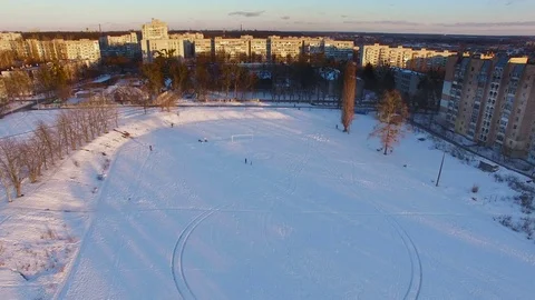 Aerial Grass surface with snow on field of football stadium Stock Footage 74167648