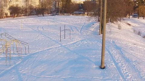 Aerial Grass surface with snow on field of football stadium Stock Footage 74168540