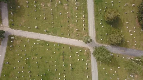 Aerial Graveyard Flyover 4K Stock Footage 115558477