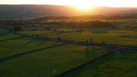 Aerial of green fields at sunset Stock-Footage 102188322
