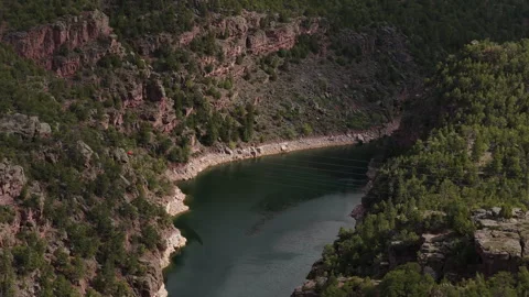 Aerial of the Green River through Flaming Gorge canyon in north Utah in spring Stock Footage 334765853