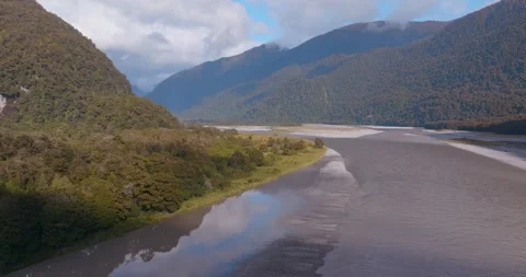 Aerial: Haast River and native forest in the west coast, Haast, New Zealand Stock Footage 246796354