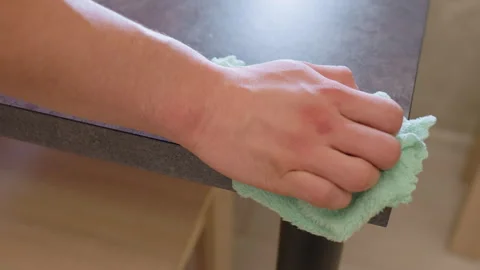 Aerial Hand Cleaning Table Surface With Green Cloth Stock Footage 319917121