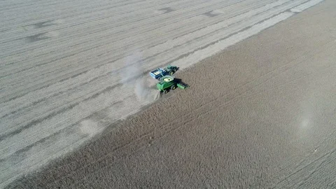 Aerial Harvest Tractor Unloading Stock Footage 103229853