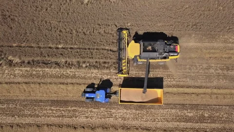 Aerial of harvester in action Stock Footage 170848403
