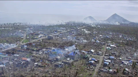 Aerial of haunting aftermath of Tacloban City after Haiyan Stock Footage