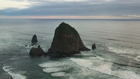 Aerial of Haystack Rock in Cannon Beach, Oregon in 4K Stock Footage 169530129