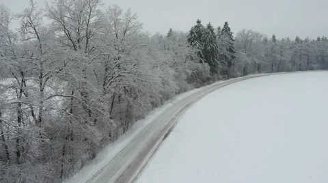 Aerial HD: Empty forest road on winter time Stock-Footage 44982181