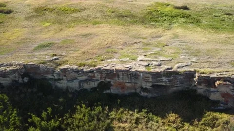 Aerial: Head-Smashed-In Buffalo Jump near Fort Macleod Alberta Stock Footage 139948822