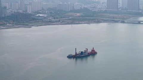 Aerial Heavy Engineering Workboat Barge on Urban Waterfront 動画素材 345835096