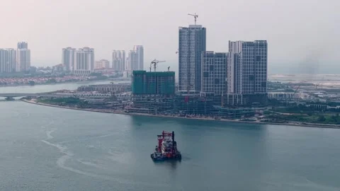 Aerial Heavy Engineering Workboat Barge Beside Waterfront High Rise Construction Видео 345835510