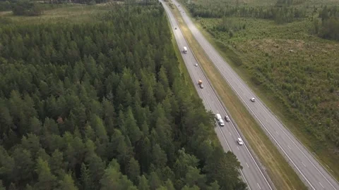 Aerial of Heavy Trafficed Highway E4 in Sweden, Cars and Trucks Vídeo Stock 135925546