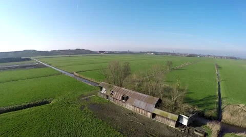 Aerial helicopter view of abandoned destroyed old shed drone 4k Stock Footage 60787853