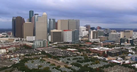 Aerial High Angle – Houston TX Skyline and Midtown District Stock Footage 297540283