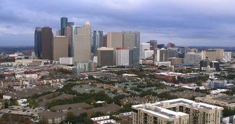 Aerial High Angle – Houston TX Skyline and Midtown District Stock Footage 297540316