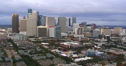 Aerial High Angle – Houston TX Skyline and Midtown District Stock Footage 297540592