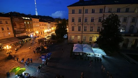 Aerial high angle night view on old town market square, people in Lviv Ukraine Stock Footage 111944216