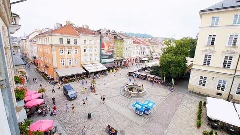 Aerial high angle panning view of old town market square, Lviv Ukraine Stock Footage 111959754