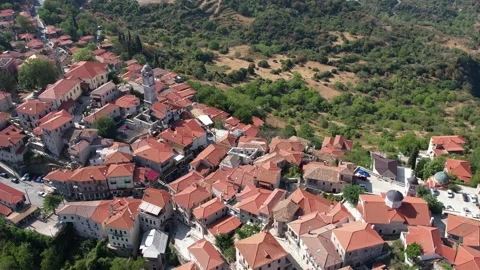 Aerial high angle shot of mountain village architecture in Greece Stock Footage 343947418