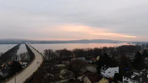 Aerial high angle sunrise over Wrightsville PA curve onto the Veteran 動画素材 106967860