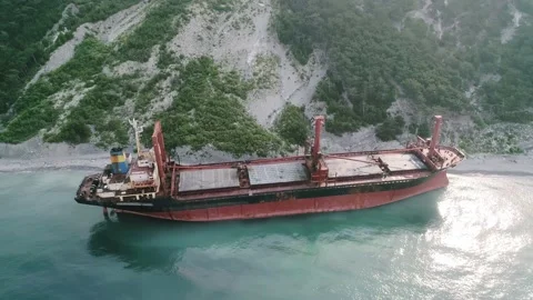 Aerial high angle view of abandoned cargo ship. Bulk carrier ran aground after Video stock 208384891