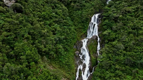Aerial high angle view, approaching a large waterfall Stock Footage 234953999