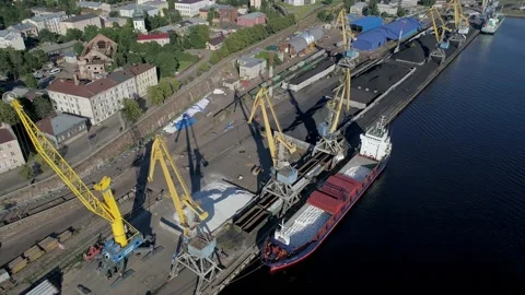 Aerial high angle view of dry cargo ship is loading in the port. Bulk carrier is Stock-Footage 171281282