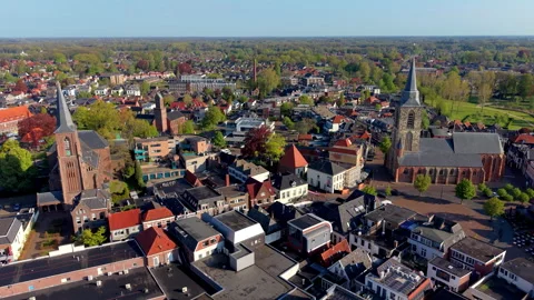 Aerial high angle view of a historic European town center featuring two Stock Footage 338257438