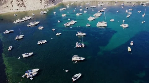 Aerial high angle view of a limestone headland separating two scenic bays f.. Stock Footage 325801534