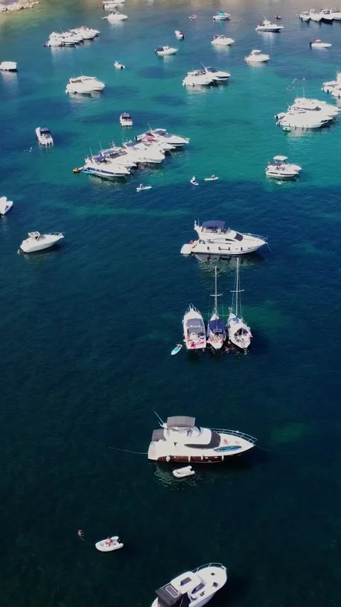 Aerial high angle view of a limestone headland separating two scenic bays f.. Stock Footage 327034639