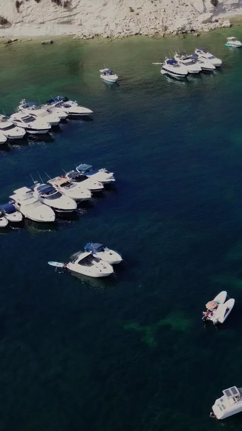 Aerial high angle view of a limestone headland separating two scenic bays f.. Stock Footage 327034695