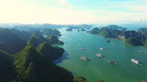 Aerial High-Angle View of Multiple Tourist Cruises Navigating Ha Long Bay Stock-Footage 330978197