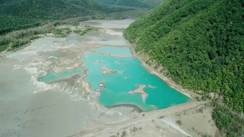 Aerial high angle view of an open-cast mine. Toxic leaks in abandoned tailing Stock Footage 168662162