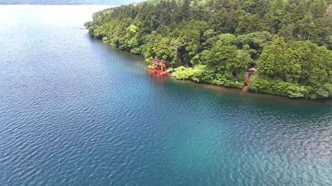 Aerial High Angle View | Peace Torii Gate | Deep Forest | Lake Ashi - 4K Video Stock Footage 328898283