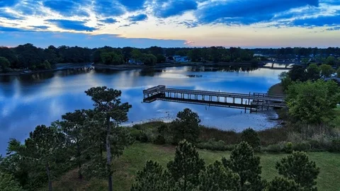 Aerial high dynamic range composited animation of Moving blue sky and water Stock Footage 108673438