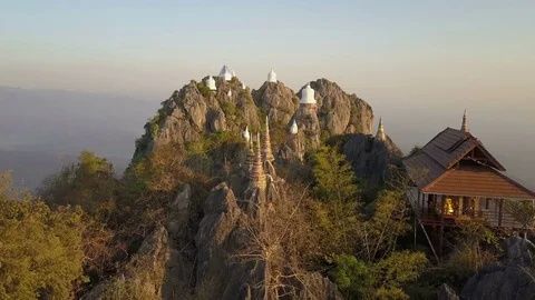 Aerial high flight over mountain temples Stock Footage