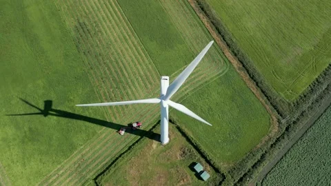 Aerial high level top down birds eye view clip of a wind turbine Stock Footage 205333787