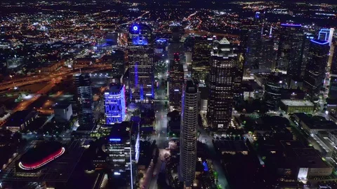 Aerial High Pan from Left to Right of Downtown Dallas Texas at Night looking Vídeo Stock 108905650