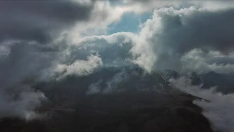 Aerial high view of dramatic clouds and sun Stock Photos