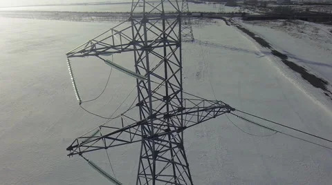 AERIAL High-voltage tower winter cold background Stock Footage 61484330