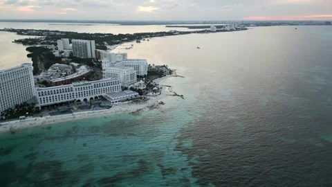 Aerial hight angle sunset above Cancun Mexico travel holiday hotel zone Video stock 250650245