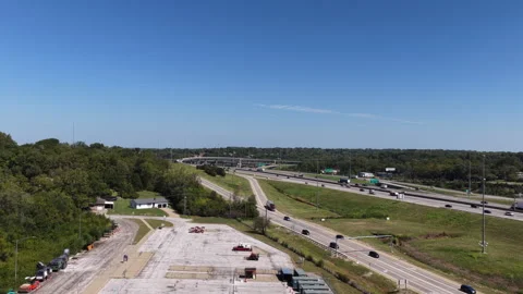 Aerial of highway 49 interchange and construction site in Kansas City Missouri Stock Footage 344810413