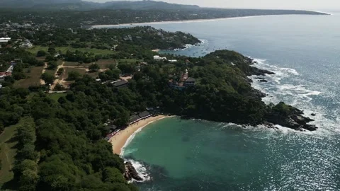 Aerial hing angle of Puerto Escondido Oaxaca coastline in Mexico Stock Footage 259415044